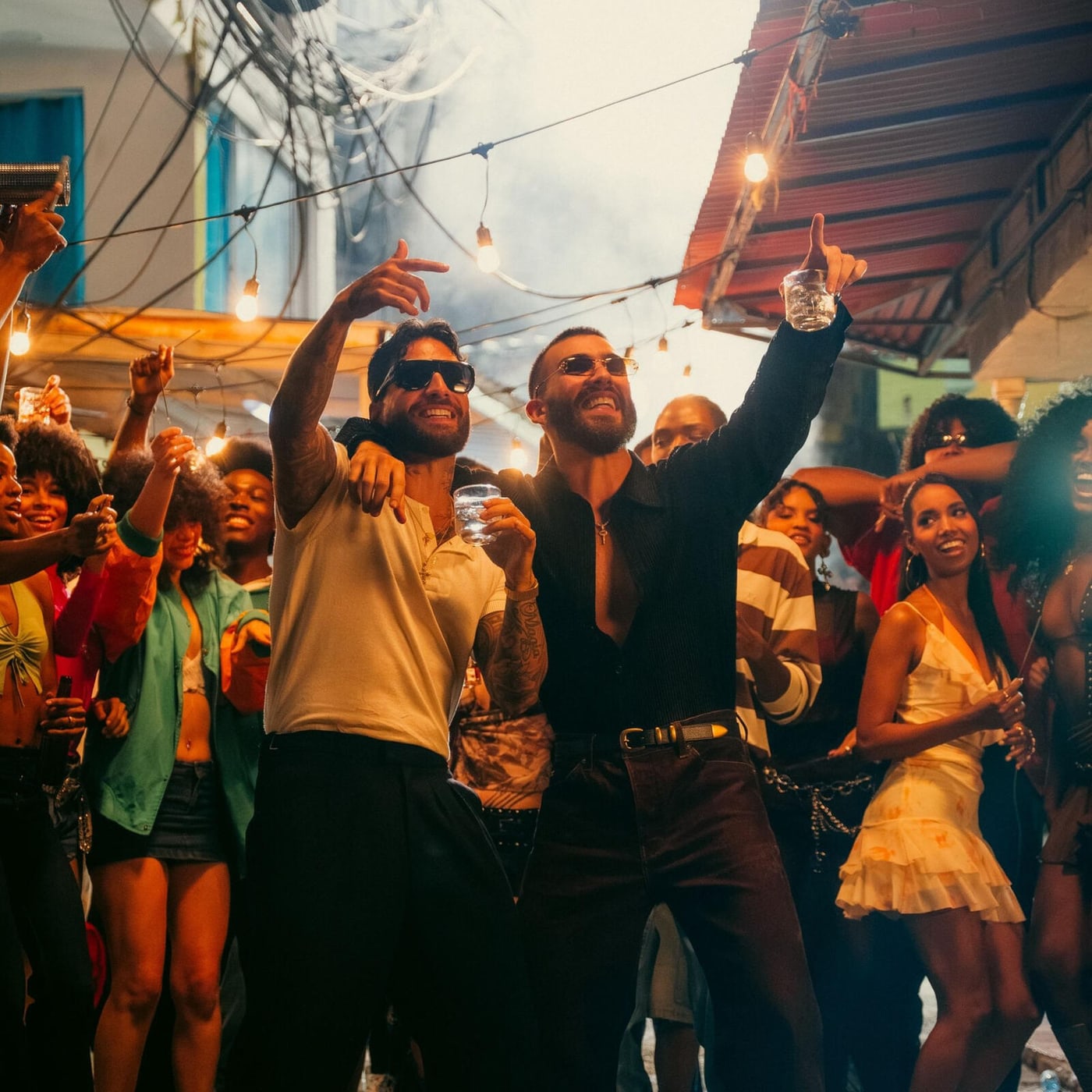 Manuel Turizo and Maluma on the cover art for “Apambichao”
