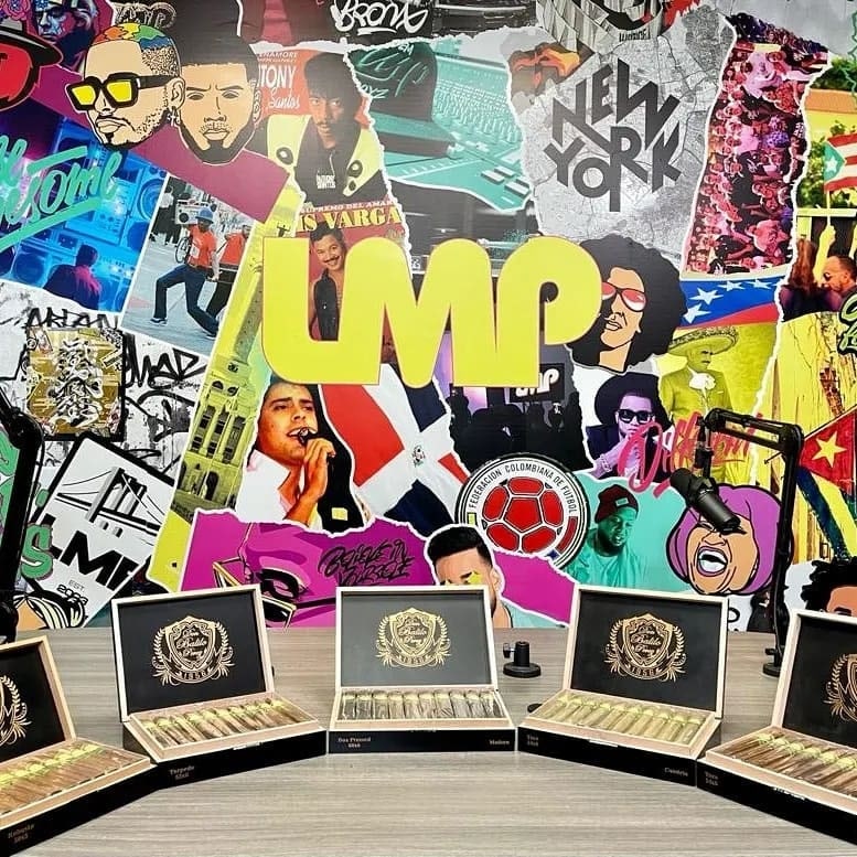 Don Balilo Pérez cigar boxes in front of the LMP mural