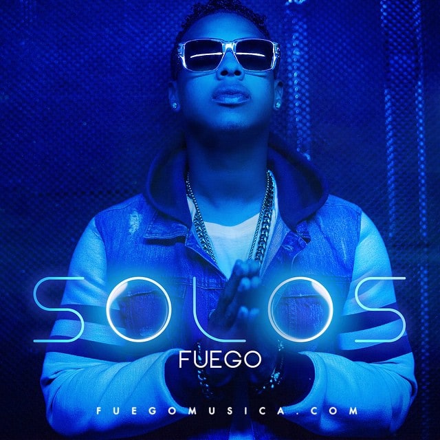 Cover art for Fuego's “Solos” — Fuego in white sunglasses under blue light