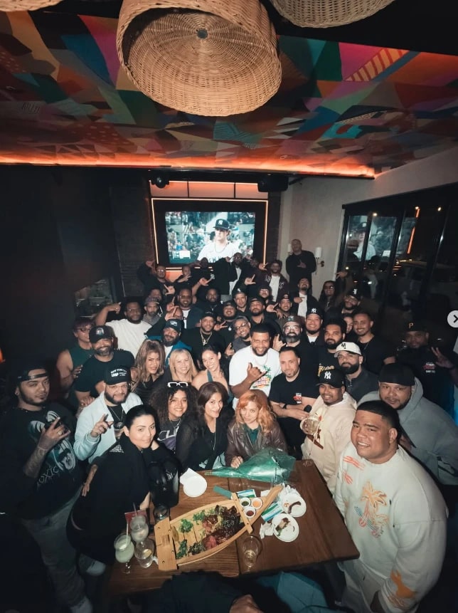 Jezzy El Chef with a crowd of LMP DJs and guests at Tiny Tapas & Bites