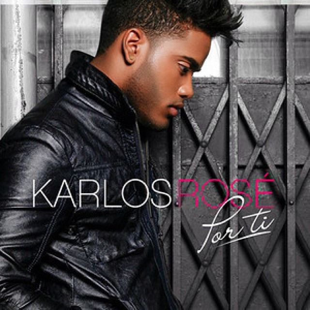 Cover art for “Por Ti” — Karlos Rosé in a black leather jacket against a metal gate, “KARLOS ROSÉ por ti”