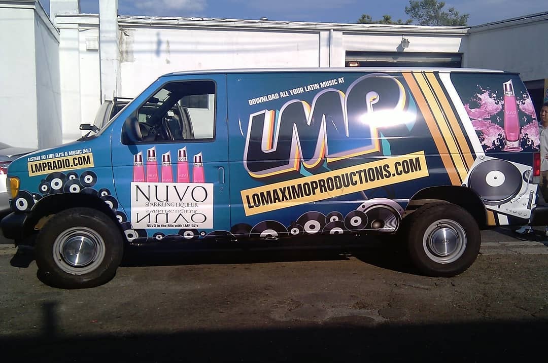 LMP's first van, sponsored by NUVO Sparkling Liqueur — pink NUVO bottles and “NUVO in the Mix with LMP DJ's” beside the LMP logo and LMPRADIO.COM